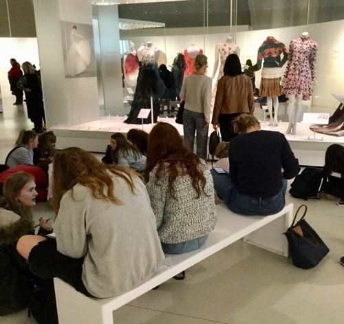 Textile students are engrossed in a history of fashion
