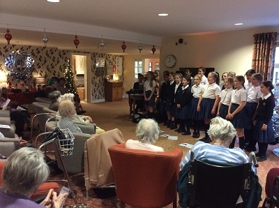 Junior School choir brings festive cheer to local residential homes